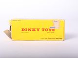 an image of a box of dinky toys sitting on top of a white surface