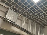 a ladder that is hanging from the ceiling in the bathroom