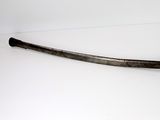an old baseball bat laying on a white surface with a white background