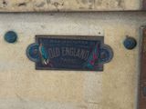 a close up of a sign on the side of a building