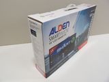 an open box of a smart tv sitting on top of a white table