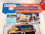 a toy train that is in a box on the table