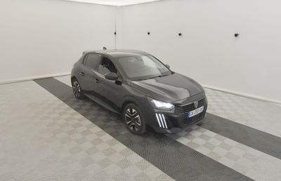 a picture of a car in a garage with a checkered floor