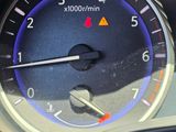a close up of a speedometer on the dashboard of a car