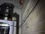 a machine that is sitting in a room next to a wall