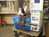 a machine that is sitting on a table in a garage