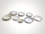 a lot of plates and bowls sitting on a table