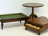 a small table with a piano and a small table with a piano on it