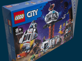 a box with a lego city set inside of it