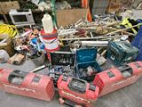 a pile of junk on the ground in a garage