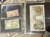 three different types of paper money in a binder