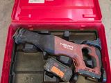 une image représentant une boîte à outils rouge contenant des outils
