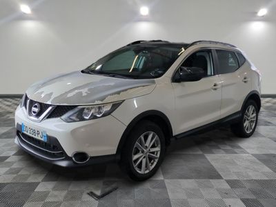 the white nissan suv is parked on a checkered tile floor