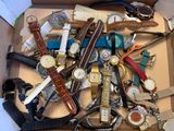 a box full of assorted watches and other watches