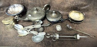 a lot of silver items that are on the table