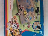 a toy book with a picture of a dog and a cat on it