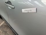 a sticker that says upauto on the side of a car