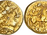 a gold coin with an image of a man on a horse