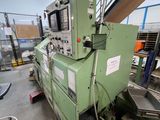 a machine that is sitting inside of a building