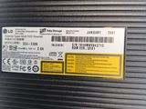 the back of a dvd drive with a yellow label on it