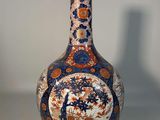 a vase that is sitting on a white table