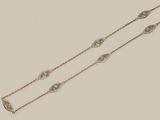 a pair of diamond - set chain necklaces