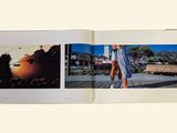 a book with a picture of a person walking on a sidewalk