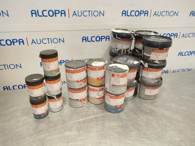 many cans of paint sitting on a table