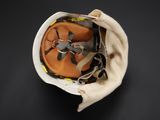 a helmet that has a propeller on top of it