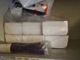 several rolls of toilet paper are stacked on top of each other