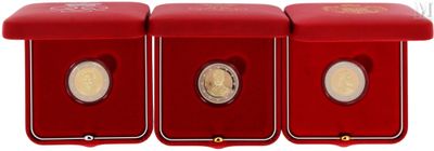 three red boxes with gold coins in them on a white background