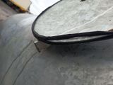 a close up of a mirror on the side of a truck