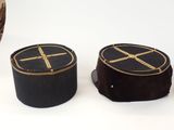two hats that are sitting on top of each other