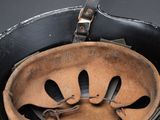 a close up of a helmet on a table