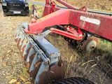 a tractor that is sitting in the dirt