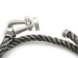 a close up of a rope with a metal hook on it