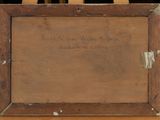 an old wooden easel with a painting on top of it