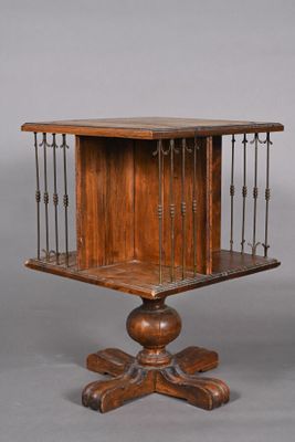 an old wooden table with a shelf on top of it