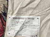 an image of a piece of fabric with a label on it