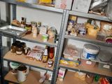 many shelves with food and condiments on them