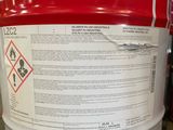 a red and white container with a label on it