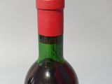 a bottle of wine that is sitting on a table