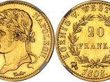 a gold coin with a woman ' s head and laurels on it