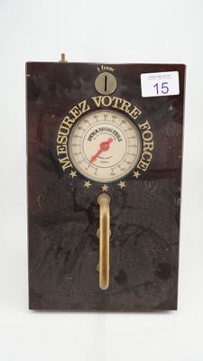 a clock that is on the wall with a sticker on it