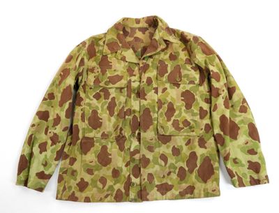 une image représentant une veste de camouflage sur fond blanc