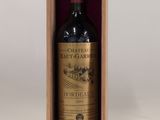 an image of a bottle of red wine in a wooden box