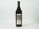 a bottle of wine that is sitting on a table