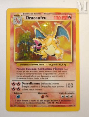 a close up of a pokemon card on a white surface