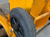 a close up of a wheel on a pallet