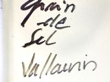 a close up of a plate with writing on it